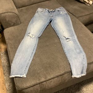 Kansan size 28 light washed, distressed jeans!